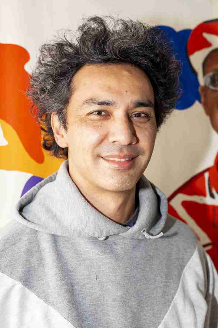 Hisham smiling